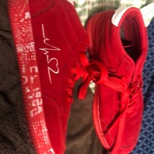 Red Sneakers with White Accents
